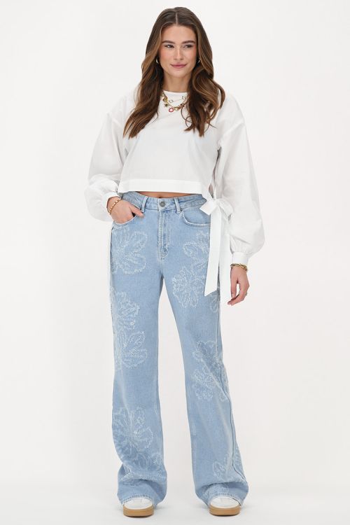 Light blue wide leg jeans with flowers