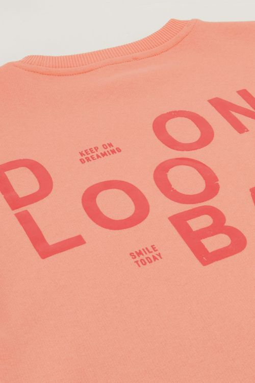 Orange sweater "Don't look back"