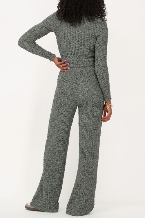 green wide leg trousers with texture