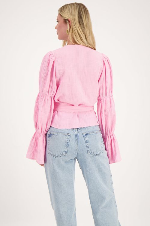 Pink blouse with wide sleeves and bow