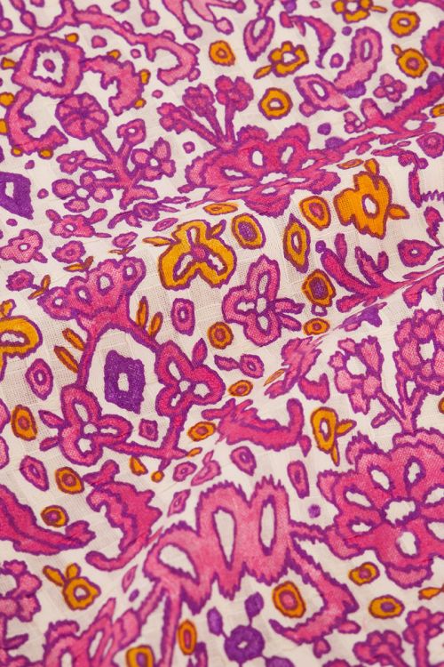 Pink dress with puff sleeves and ikat floral print