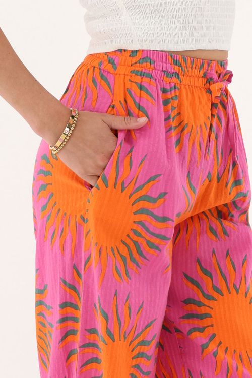 Roze wide leg broek met zonnenprint