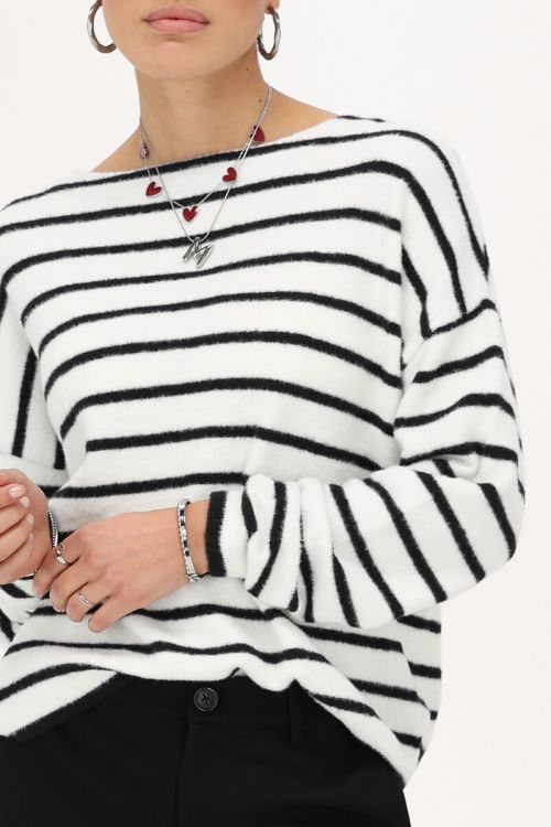 White sweater with black stripes
