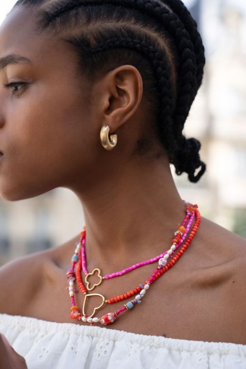 Pink beaded necklace with clover