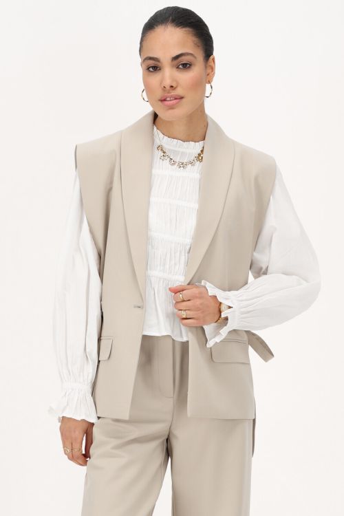 Beige gilet with bows | My Jewellery