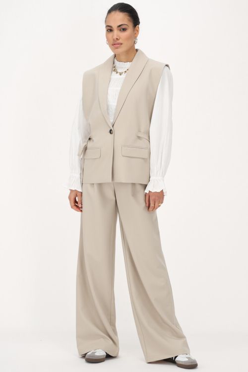Beige gilet with bows | My Jewellery