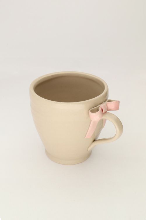 Beige Tasse mit Schleife