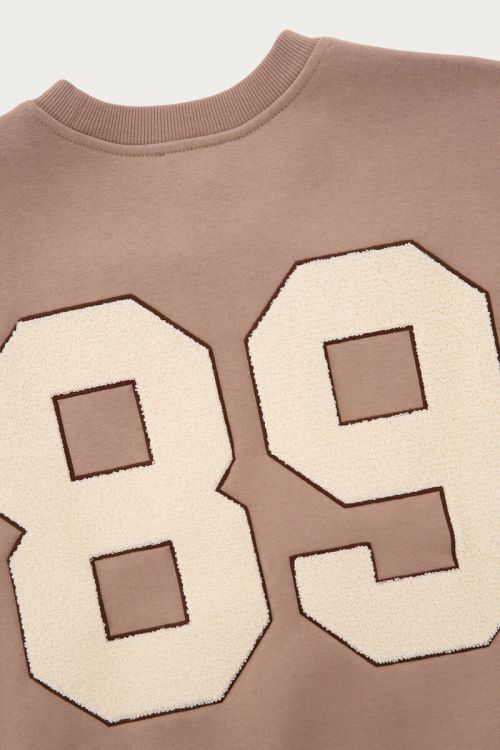 Beige sweatshirt with teddy patch | My Jewellery