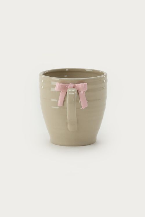 Beige tea cup with bow | My Jewellery