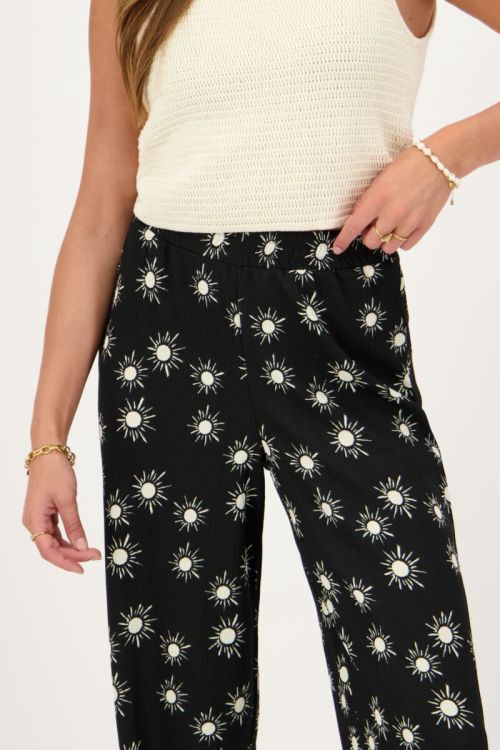 Black crinkle pants with sun print | My Jewellery