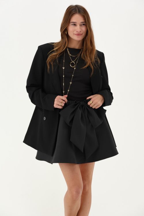 Black mini skirt with statement bow | My Jewellery