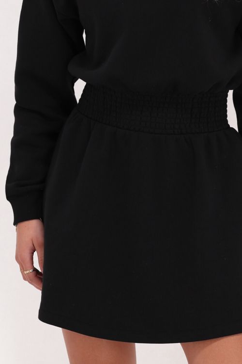 Black sweater dress with smock | My Jewellery