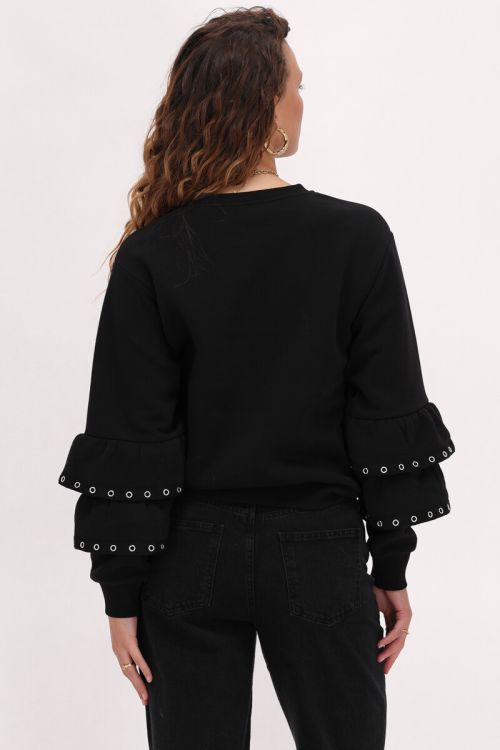 Black sweater with ruffle sleeves and studs | My Jewellery