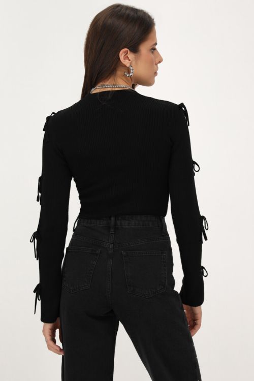 Black top with bows on sleeves | My Jewellery