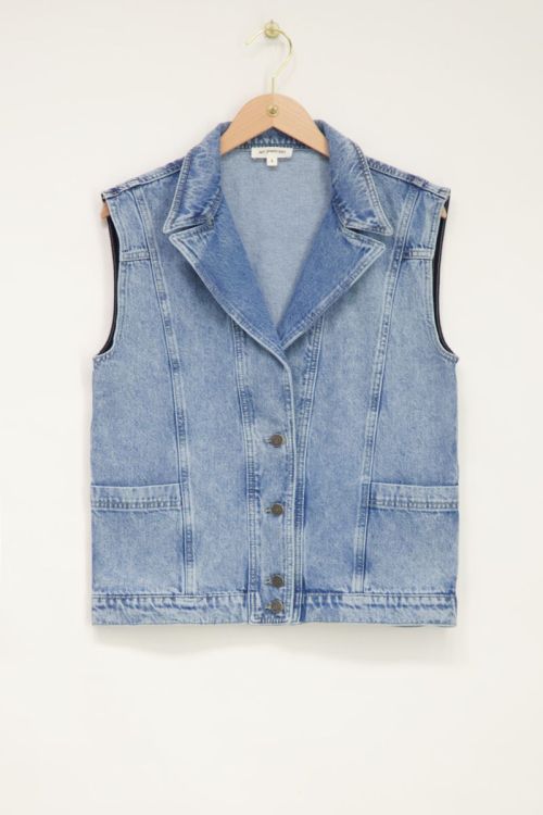Blue denim gilet with pockets