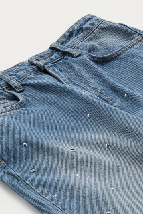Blue wide leg jeans with eyelets & studs | My Jewellery