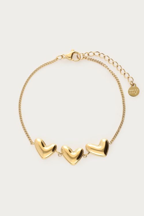 Bold bracelet with three hearts