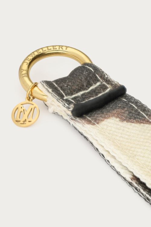 Bruine sleutelhanger met koeienprint