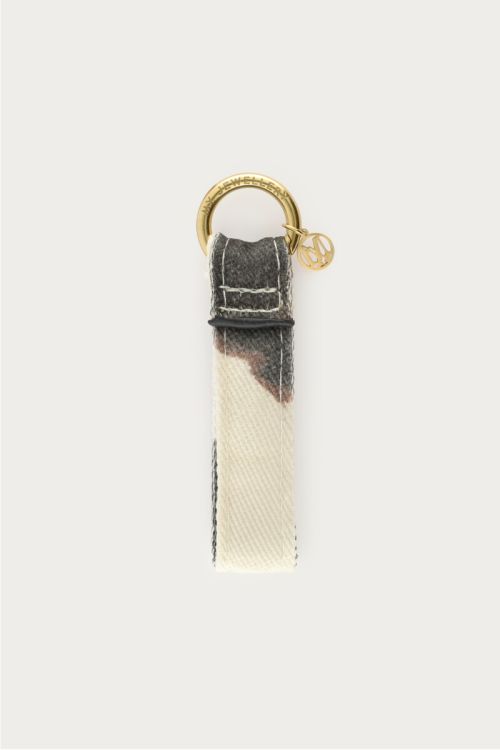 Bruine sleutelhanger met koeienprint