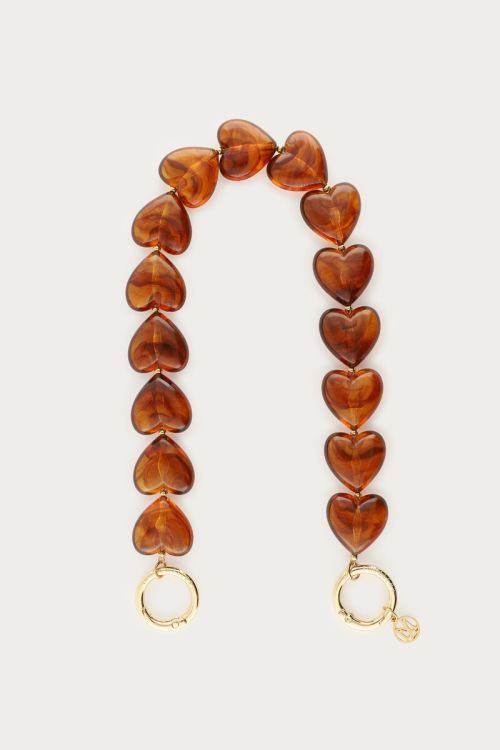 Brown phone cord with hearts
