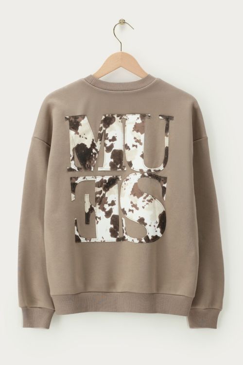 Brown sweatshirt with cow print “Muse” patch | My Jewellery