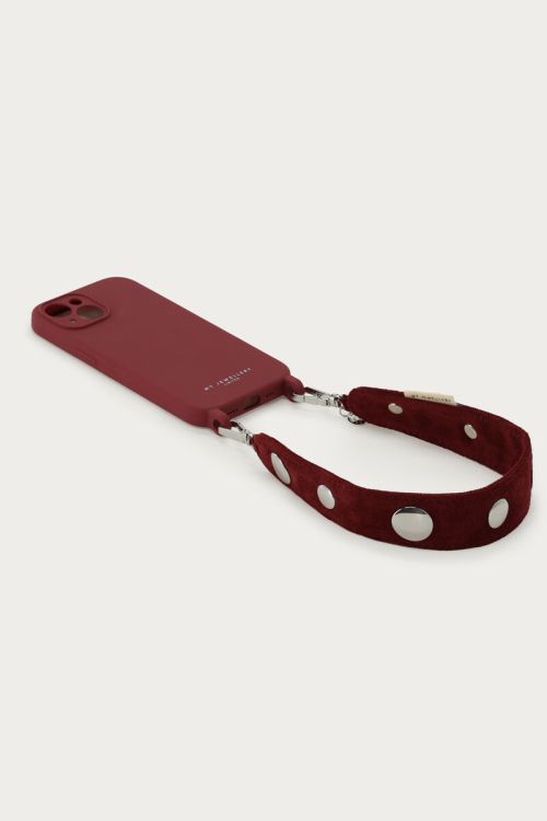 Dark red phone cord in suede look with studs | My Jewellery