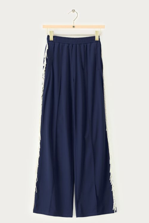 Dunkelblaue Hose mit weitem Bein und Perlenimitat