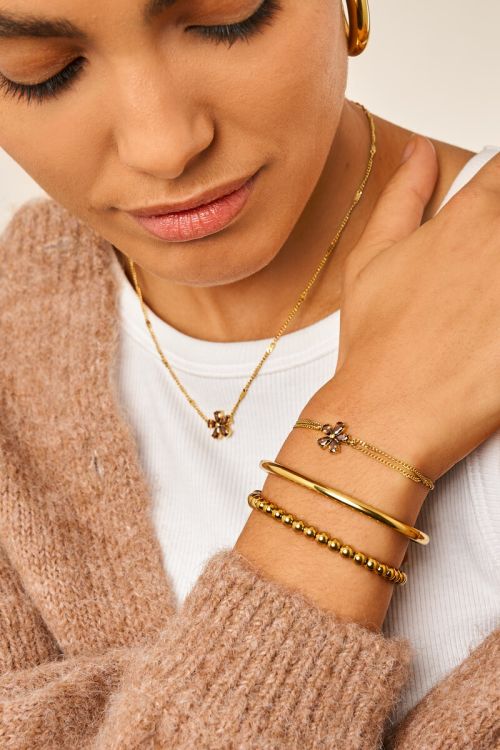 Double bracelet with brown rhinestone flower