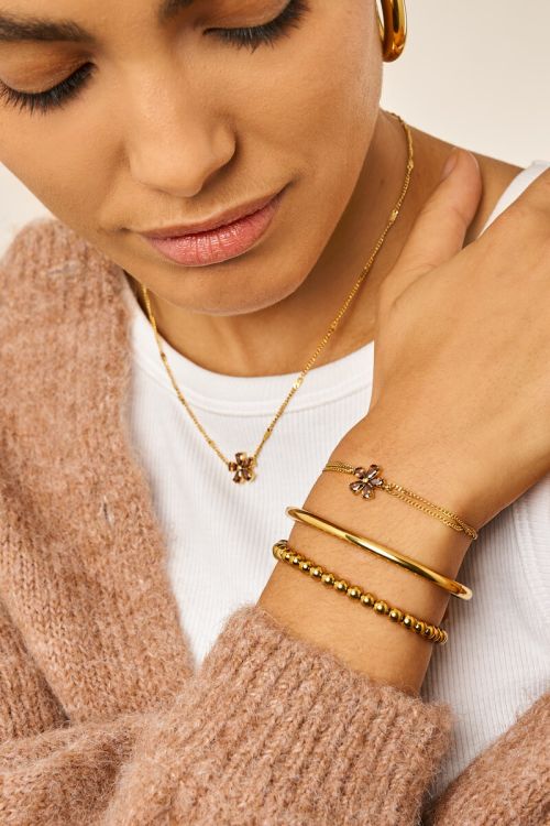 Double bracelet with brown rhinestone flower