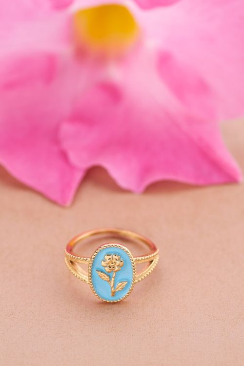 Art blue statement ring with flower