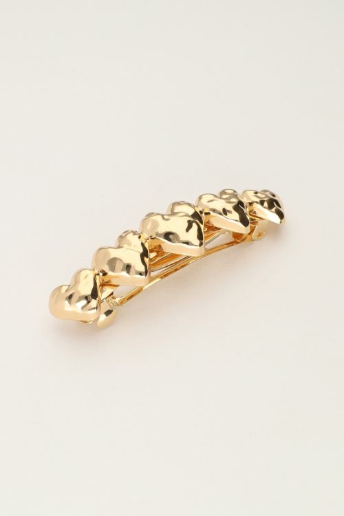 Barrette à cheveux couleur dorée avec cinq cœurs