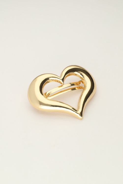 Gold coloured hair clip with open heart