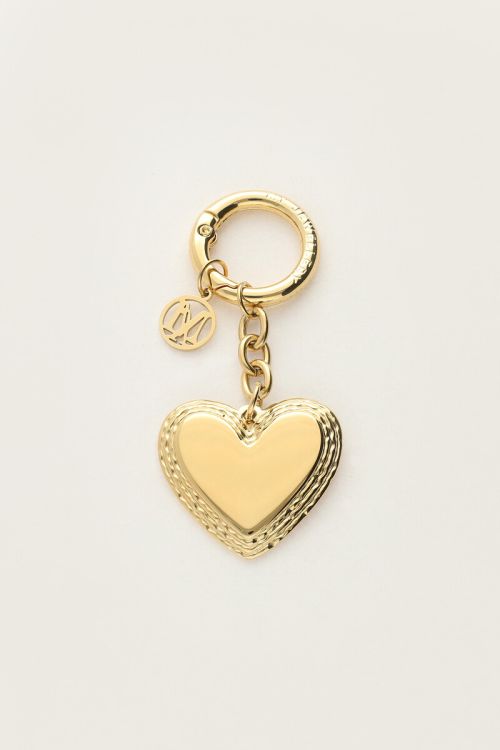 Goudkleurige bag charm met hartje