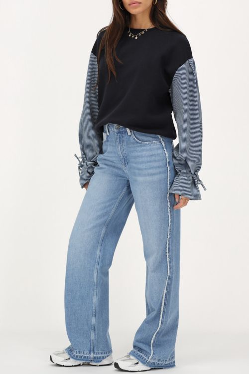Light blue wide leg jeans with contrasting pocket | My Jewellery