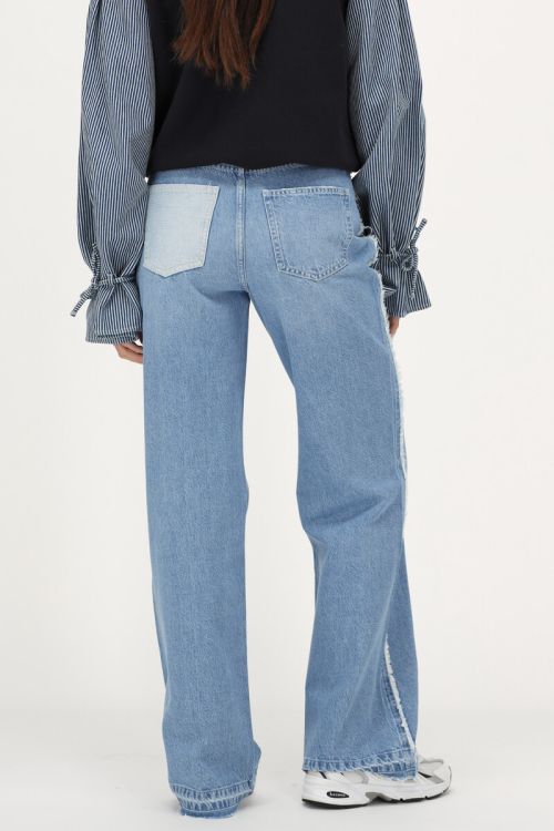 Light blue wide leg jeans with contrasting pocket | My Jewellery