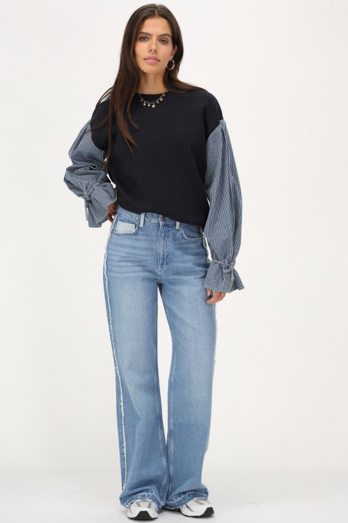 Light blue wide leg jeans with contrasting pocket | My Jewellery