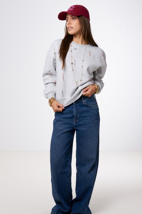 Light grey sweater with coloured beaded fringes | My Jewellery