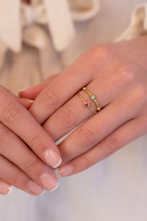 Minimalistische vintage ring met mint groene strass