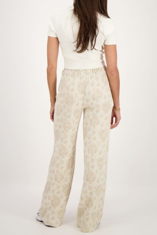 Beige trousers with jacquard flower print | My Jewellery