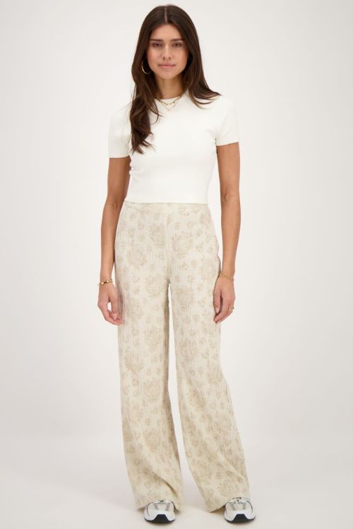 Beige trousers with jacquard flower print | My Jewellery