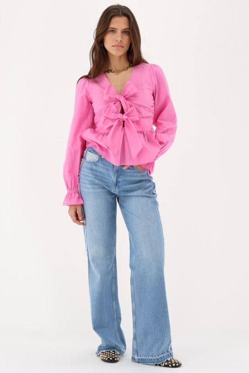 Pink top with bows & peplum | My Jewellery