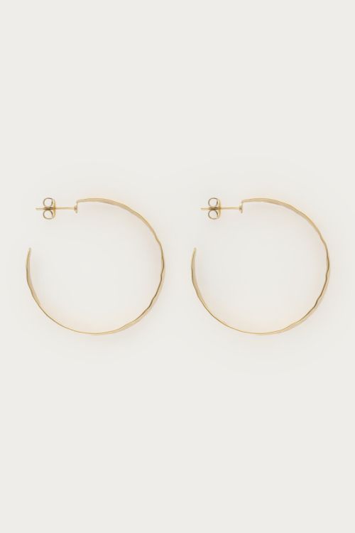 Open hoop earrings with texture