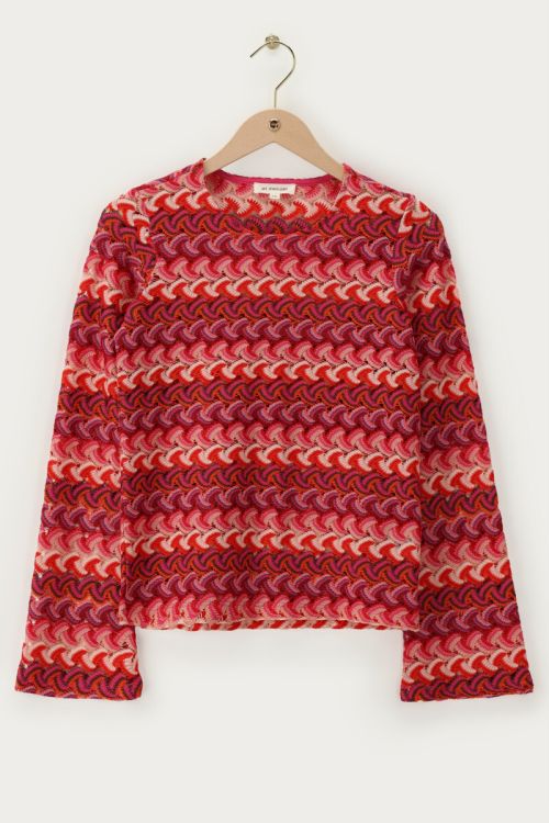 Top en crochet rose à manches longues