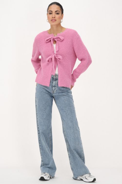 Pink knit sweater with bows