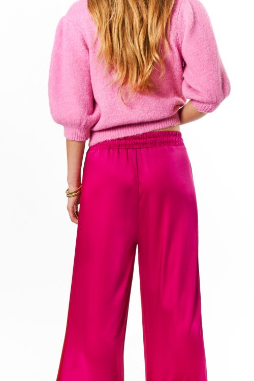 Pink wide leg trousers with red side stripe | My Jewellery