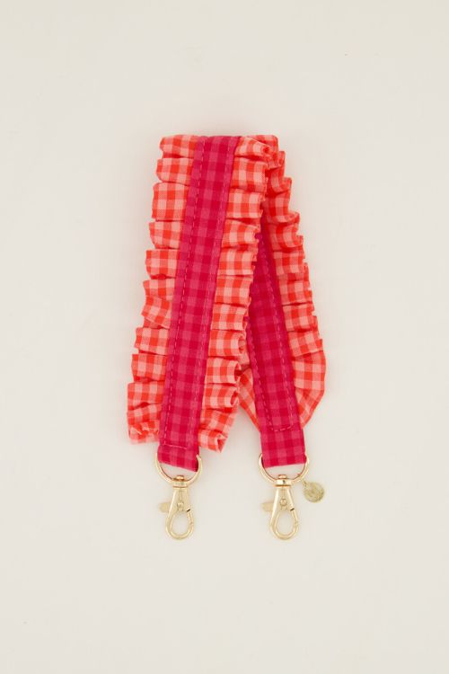 Pink phone cord with plaid