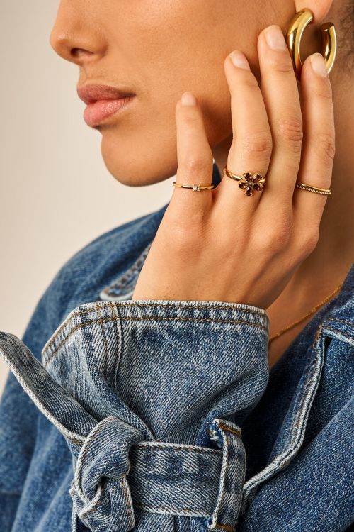 Ring with brown rhinestone flower
