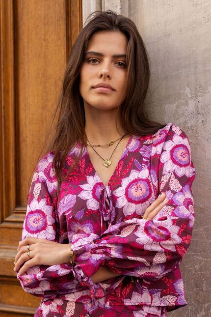 Brown top with bows and pink floral print