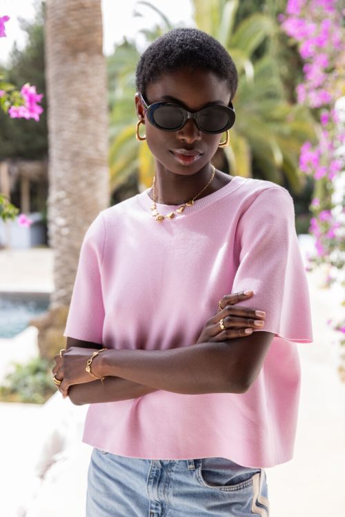 Light pink top with short sleeves & bows | My Jewellery