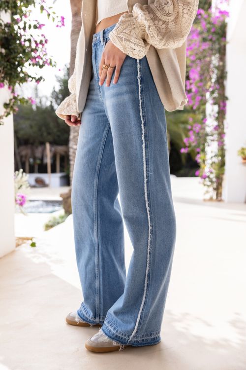 Light blue wide leg jeans with contrasting pocket | My Jewellery
